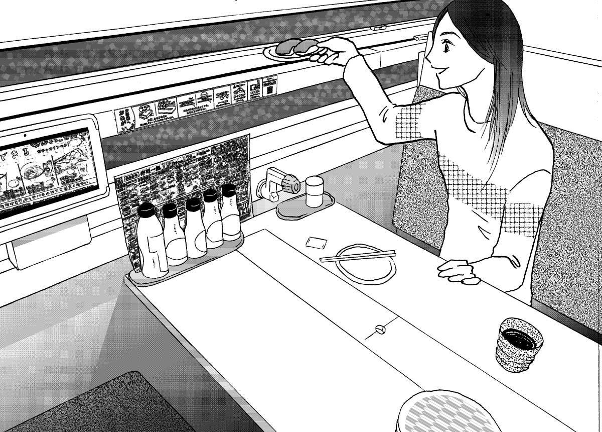 Woman sitting in a box seat at a conveyor-belt sushi restaurant